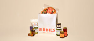 Group shot of the products in Provisions with the Birdies paper bag